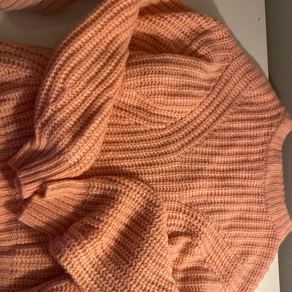 Size small, pink and fluffy.